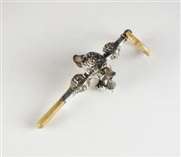 Lot 73 - A silver mounted rattle