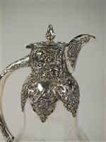 Lot 14 - A silver mounted claret jug