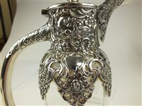 Lot 14 - A silver mounted claret jug