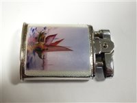 Lot 14 - A silver and enamelled compact set