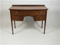 Lot 387 - An Edwardian crossbanded mahogany bowfront side table