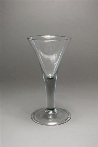 Lot 117 - An unusually large George III wine glass
