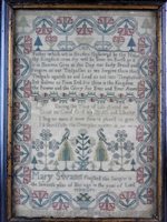 Lot 145 - A fine coloured wool work sampler by Mary Swann