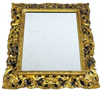 Lot 292 - A Florentine style carved giltwood wall mirror