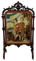 Lot 294 - A Victorian walnut framed fire screen