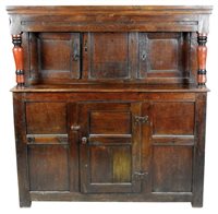 Lot 705 - An oak court cupboard