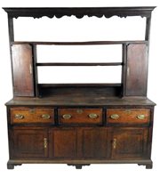 Lot 504 - A George III oak crossbanded Shropshire dresser