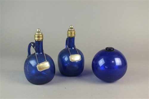 Lot 124 - A pair of Bristol blue glass decanters