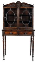 Lot 316 - A Regency mahogany and rosewood crossbanded cabinet on stand