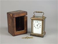 Lot 284 - A brass cased carriage time piece