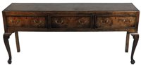 Lot 317 - A George III oak and walnut crossbanded dresser base