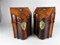 Lot 323 - A pair of George III mahogany serpentine front knife boxes