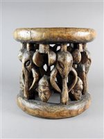 Lot 152 - A Nigerian carved wood stool
