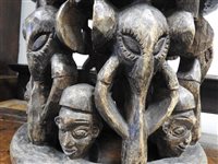 Lot 152 - A Nigerian carved wood stool