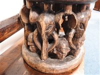 Lot 152 - A Nigerian carved wood stool