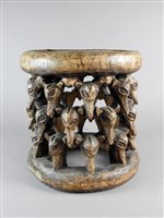 Lot 153 - A Nigerian carved wood stool, early 20th century