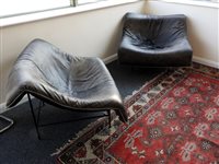 Lot 479 - A pair of leather butterfly fauteuils