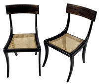 Lot 332 - A set of six regency rosewood and brass strung bar back dining chairs