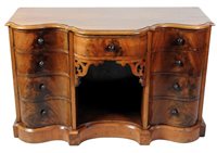 Lot 333 - A pair of Victorian mahogany serpentine front sided cabinets