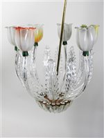 Lot 454 - A six branch glass chandelier