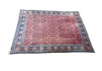 Lot 342 - A large Persian/Turkish carpet