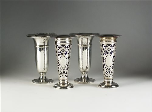 Lot 12 - Two pairs of silver vases