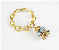 Lot 238 - A bracelet and charm