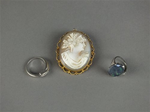 Lot 16 - An opal doublet ring, 9ct white gold ring and cameo brooch