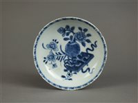 Lot 77 - A South East Asian porcelain bowl, oil jar and a Chinese saucer