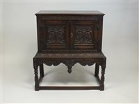 Lot 455 - A Victorian carved oak cabinet