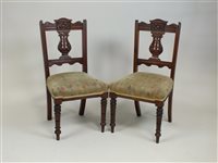 Lot 275 - A set of six late Victorian walnut dining chairs