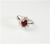Lot 200 - A ruby and diamond cluster ring