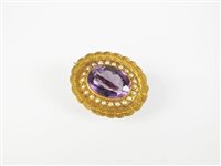 Lot 263 - An amethyst and seed pearl brooch