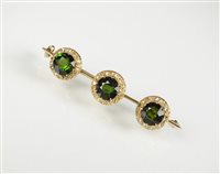 Lot 169 - A tourmaline and diamond triple cluster brooch