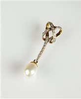 Lot 69 - A cultured pearl and diamond pendant