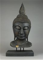 Lot 87 - A very large carved wood head of Buddha