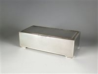 Lot 54 - A silver cigarette box with masonic inscription