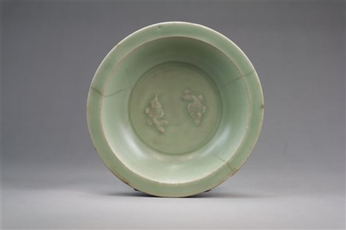 Lot 2 - A Chinese Longquan celadon 'twin fish' bowl