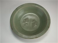 Lot 2 - A Chinese Longquan celadon 'twin fish' bowl
