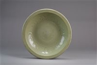 Lot 5 - A Chinese Longquan celadon carved and
incised dish