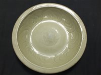 Lot 5 - A Chinese Longquan celadon carved and
incised dish