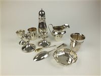 Lot 83 - A pair of silver mounted candlesticks