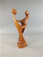 Lot 431 - A Simon Randers mobel Fabrik Denmark teak sculpture of an embracing couple