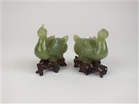 Lot 113 - A pair of Chinese jade figures of birds