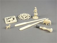 Lot 285 - A group of various ivory works of art including two brooches