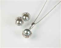 Lot 170 - An 18ct gold cultured pearl and diamond necklace and earrings