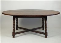 Lot 376 - A Titchmarsh and Goodwin oval oak dining table