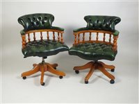 Lot 382 - A pair of modern swivel office chairs