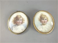 Lot 400 - Two oval portrait miniatures on ivory