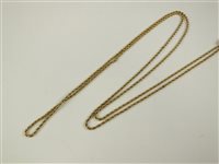 Lot 117 - A yellow metal rope twist guard chain